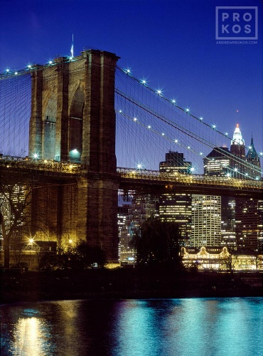 Night photography of the Brooklyn Bridge and Manhattan, New York City. Fine art prints of this photo are available framed in various styles. 