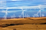 A landscape photo of a field of wind turbines in motion at the Biglow Canyon, Oregon wind farm. Limited edition fine art prints of this photo are available framed in various styles. 