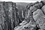 A dramatic black and white landscape from Black Canyon of the Gunnison River National Park in Colorado. Black Canyon is the steepest canyon in North America. Large format fine art prints of this photo are available framed in various styles.