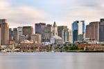 A panoramic skyline of Boston, Massachusetts captured with a long-exposure time by photographer Andrew Prokos