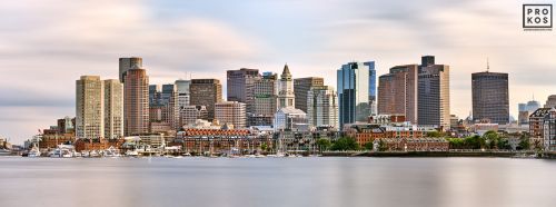A panoramic skyline of Boston, Massachusetts captured with a long-exposure time by photographer Andrew Prokos