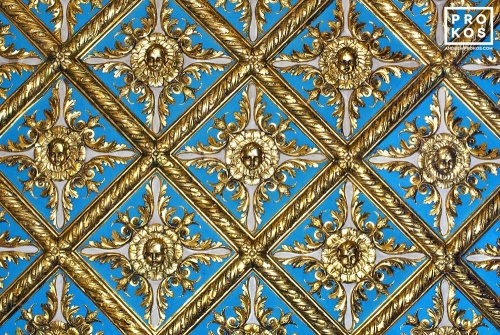 An architectural detail photo of the gilded ceiling in the Gold Room at the Breakers Hotel, Palm Beach, Florida