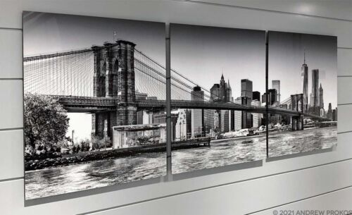 Black and White Photography - A ninety inch black and white limited edition photograph of the Brooklyn Bridge skyline by photographer Andrew Brooklyn Bridge Skyline Panoramic Triptych - Prokos, mounted with acrylic and split into three panels.