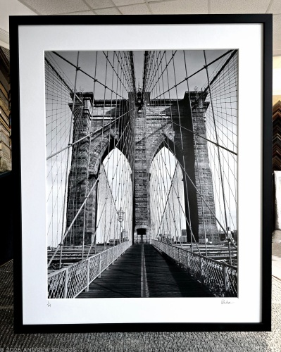 A 40 inch matted and framed black and white print of Brooklyn Bridge Tower and Cables by Photographer Andrew Prokos