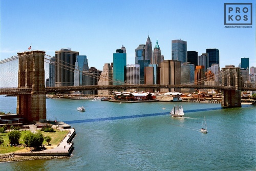 A high-definition skyline photo of Lower Manhattan and the Brooklyn Bridge during the day, New York City