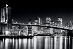 An ultra high-definition black and white skyline of the Brooklyn Bridge and Lower Manhattan at Night, New York City. Large-scale fine art prints of this photo are available up to 150 inches wide.
