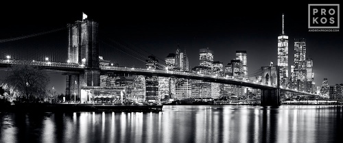 An ultra high-definition black and white skyline of the Brooklyn Bridge and Lower Manhattan at Night, New York City. Large-scale fine art prints of this photo are available up to 150 inches wide.