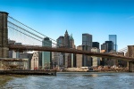 A panoramic skyline of the Brooklyn Bridge and Lower Manhattan during the day, New York City. Large format prints up to 150 inches wide are available from this ultra-high-resolution photo.