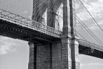A fine art architectural photo of the Manhattan side tower of the Brooklyn Bridge in black and white, New York City. Fine art prints of this photo are available framed in various styles, please inquire. 