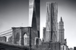 An ultra high-definition black and white photo of the Brooklyn Bridge and the skyscrapers of Lower Manhattan, including One World Trade Center and 8 Spruce Street