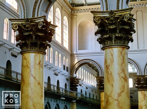 An architectural photo of the interior of the National Building Museum and its colossal columns, Washington DC