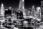 A vertical panoramic cityscape photo of the Burj Khalifa tower and Dubai as seen at night in black and white, United Arab Emirates. Limited edition fine art prints of this photo are available up to 96 inches in height.
