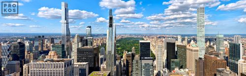 A panoramic skyline of the supertall skyscrapers of Midtown Manhattan NYC and Central Park, as seen looking north from Rockefeller Center. Photograph by Andrew Prokos.