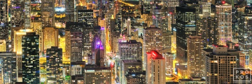 A high definition panoramic city view of the skyscrapers of Chicago at night, taken from the top of Hancock Center. Available as large-scale limited edition prints 90+ inches in width.