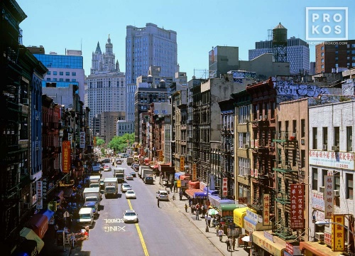 A color street scene photo of East Broadway in Chinatown, New York City. Framed fine art prints of this photo are available up to 50 inches in width. 
