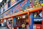 A photo of the colorful painted freakshow signs at Coney Island, Brooklyn, New York