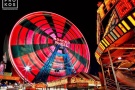 A high-definition long-exposure photo of Coney Island's Wonder Wheel ferris wheel at night in Brooklyn, New York