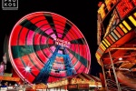 A high-definition long-exposure photo of Coney Island's Wonder Wheel ferris wheel at night in Brooklyn, New York