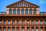 A fine art architectural photo of the red brick facade of the National Building Museum, Washington DC