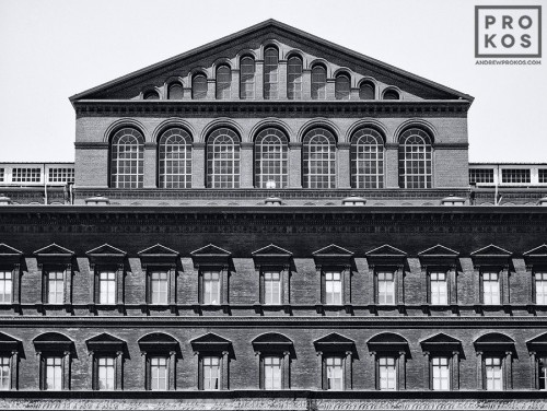 A black and white architectural photo of the brick facade of the National Building Museum in Washington DC