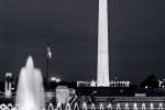 A black and white long-exposure photo of the Washington Monument from the World War II Memorial at Night, Washington, DC