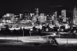 A black and white panoramic cityscape of Denver, Colorado seen at night. Large-scale fine art prints of this photo are available up to 120 inches wide and framed in various styles. 