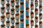 A fine art architectural photo of colorful tiered balconies from a contemporary architectural facade in Dubai, United Arab Emirates. Framed fine art prints of this photo are available up to 80 inches in width