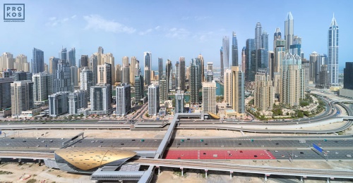 A high-definition panoramic view of the tall towers of Dubai Marina, United Arab Emirates. Large-scale fine art prints of this photo are available up to 120 inches in width and framed in various wood, metal, and acrylic styles.