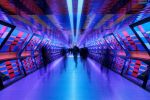 A long-exposure photograph capturing pedestrians passing through one of the colorful transit tunnels of the Elizabeth Line in London, UK. Limited edition fine art prints of this photograph are available up to 72 inches in width and framed in various styles.