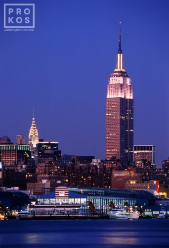 A view of The Empire State Building and Hudson River at dusk, New York City