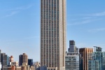 A vertical panoramic view of the Empire State Building and Midtown Manhattan, New York City. High-definition fine art prints of this photo are available up to 90 inches in height and framed in wood, metal, and acrylic styles.