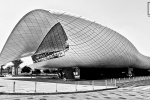 A black and white panoramic view of the contemporary architecture of the Etihad Museum, Dubai, UAE