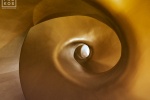 An architectural detail photo of the spiral staircase in the Etihad Museum, Dubai, UAE