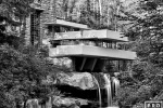 A long-exposure black and white view of Fallingwater, the famous home in Pennsylvania built by architect Frank Lloyd Wright.