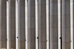 A view of the 8th Avenue steps and columned exterior of the Farley Building and Moynihan Train Hall in Manhattan, NYC by architectural photographer Andrew Prokos. Fine art prints of this photo are available framed in various styles. 