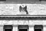 A black and white architectural photo of the facade of the Federal Reserve Eccles Building with eagle statue in Washington DC. Fine art prints of this photo are available framed in contemporary styles.