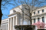 A color photograph of the United States Federal Reserve in Washington DC, with fountain in the foreground. Framed fine art prints of this photo are available up to 40 inches. 