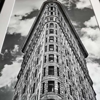 A matted and framed fine art print of the Flatiron Building in New York City by Photographer Andrew Prokos