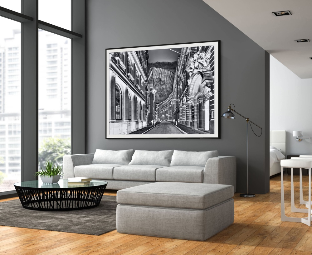 A large-scale black and white framed photo of London from the conceptual series Inverted by photographer Andrew Prokos, seen in a luxury home.