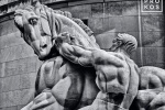 A black and white fine art photo of the statue of Man Controlling Trade at the Federal Trade Commission in Washington DC
