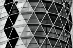 Black and white photography of a geometric architectural facade seen close-up. Fine art prints of this photo are available framed in contemporary styles. 