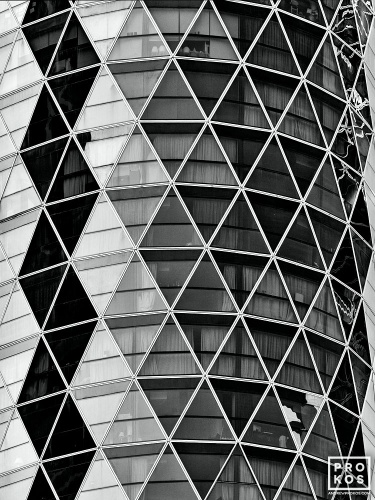 Black and white photography of a geometric architectural facade seen close-up. Fine art prints of this photo are available framed in contemporary styles. 