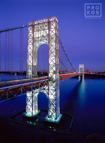 A long-exposure architectural photo of the George Washington Bridge at dusk, New York City