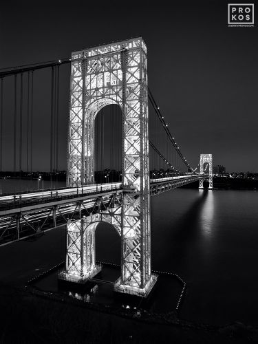 A black and white view of the George Washington Bridge at night, New York City. Limited edition fine art prints of this photo are available framed in various styles