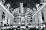 A black and white fine art photo of Grand Central Station's main hall at rush hour, New York City.
