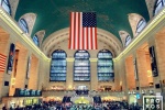 A high-definition long-exposure photo of the interior of Grand Central Station in color, New York City