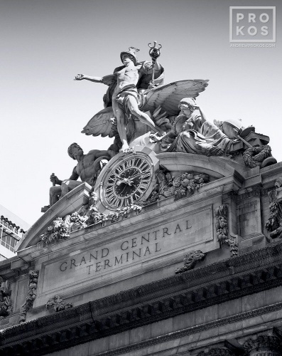 A fine art architectural photograph of Grand Central Station's facade and Mercury Clock in black and white, New York City