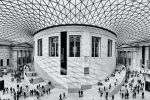 A black and white photograph of the interior of the Great Court in the British Museum, with its contemporary mesh canopy, London, United Kingdom. Limited edition fine art prints of this photo are available up to 72 inches in width.