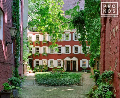 A charming Greenwich Village mew with houses dating from the 1820's, New York City. Framed fine art prints of this photo are available in various sizes, please inquire. 