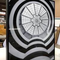 A large-scale black and white limited edition photo of 'Guggenheim Museum Interior V' by photographer Andrew Prokos in production for a new collector. The archival print is mounted on dibond and set in a black solid wood box frame.